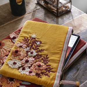 Embroidered velvet laptop sleeve