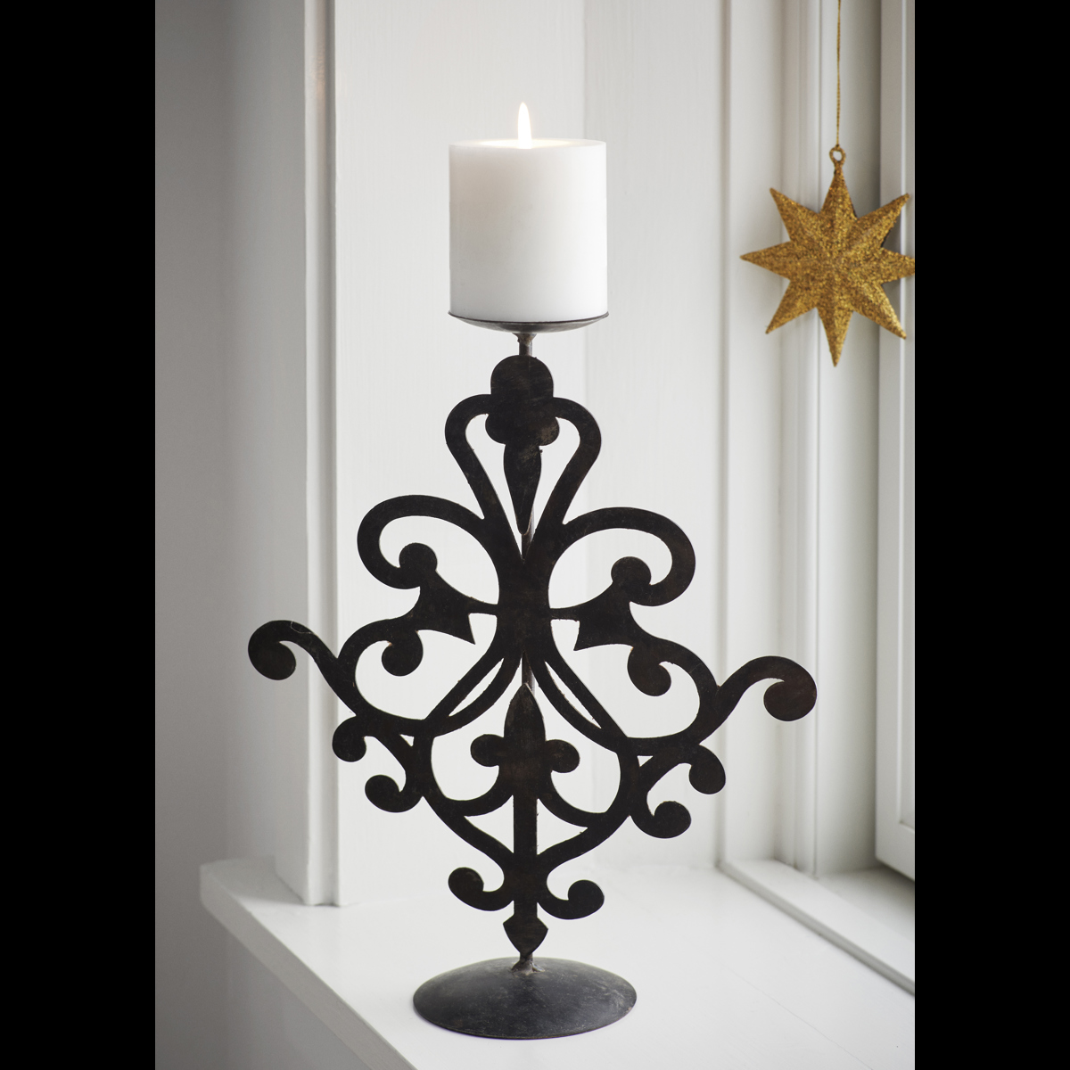 Recycled iron candle stand