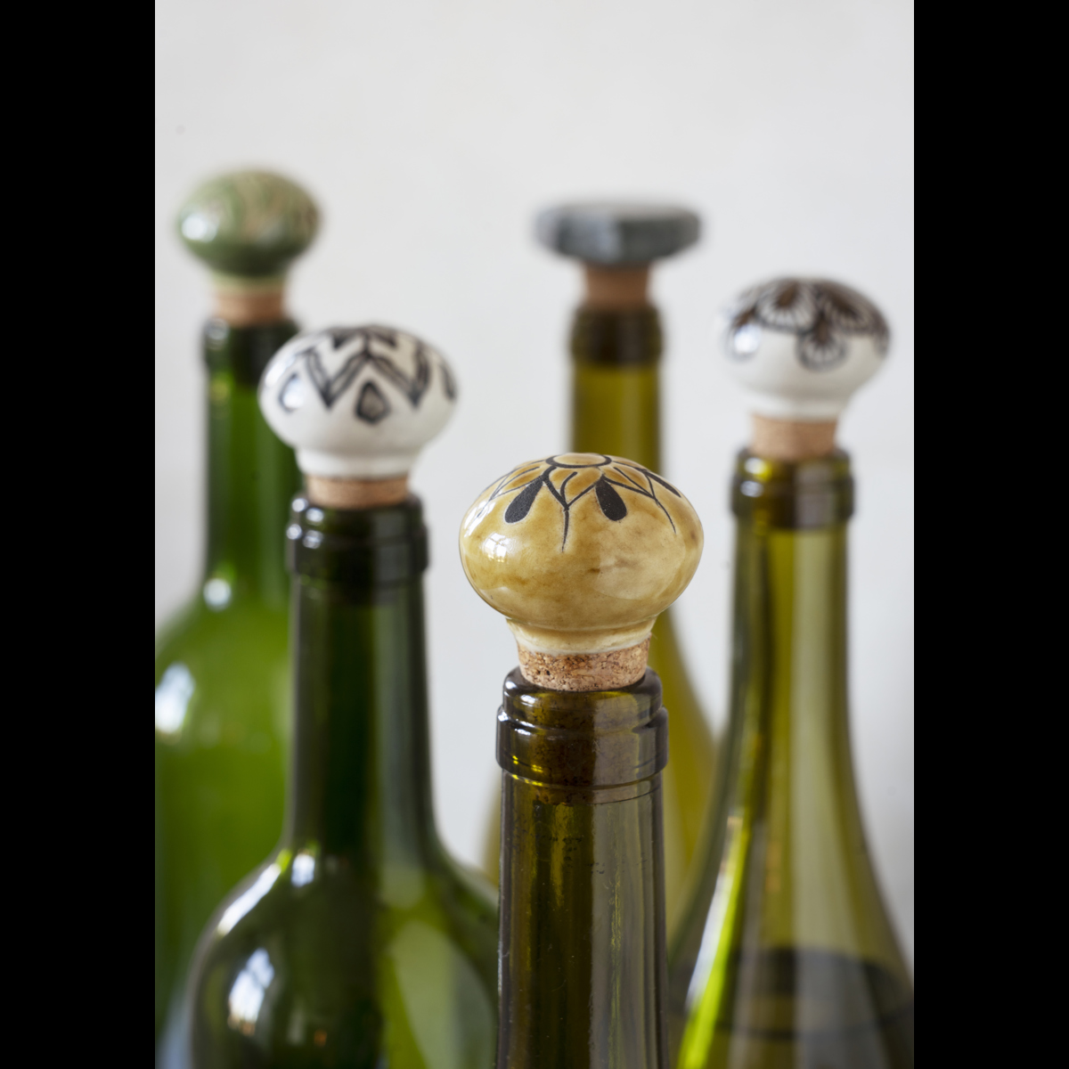 Hand-painted stoneware bottle stopper