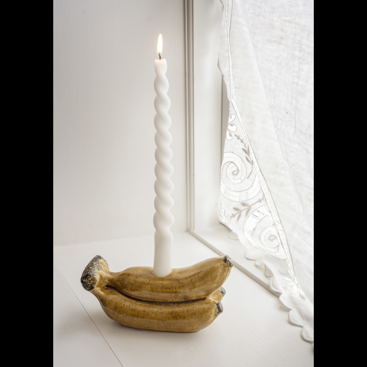 Banana candle holder