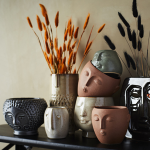 Flower pot w/ face imprint