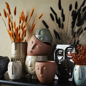 Flower pot w/ face imprint