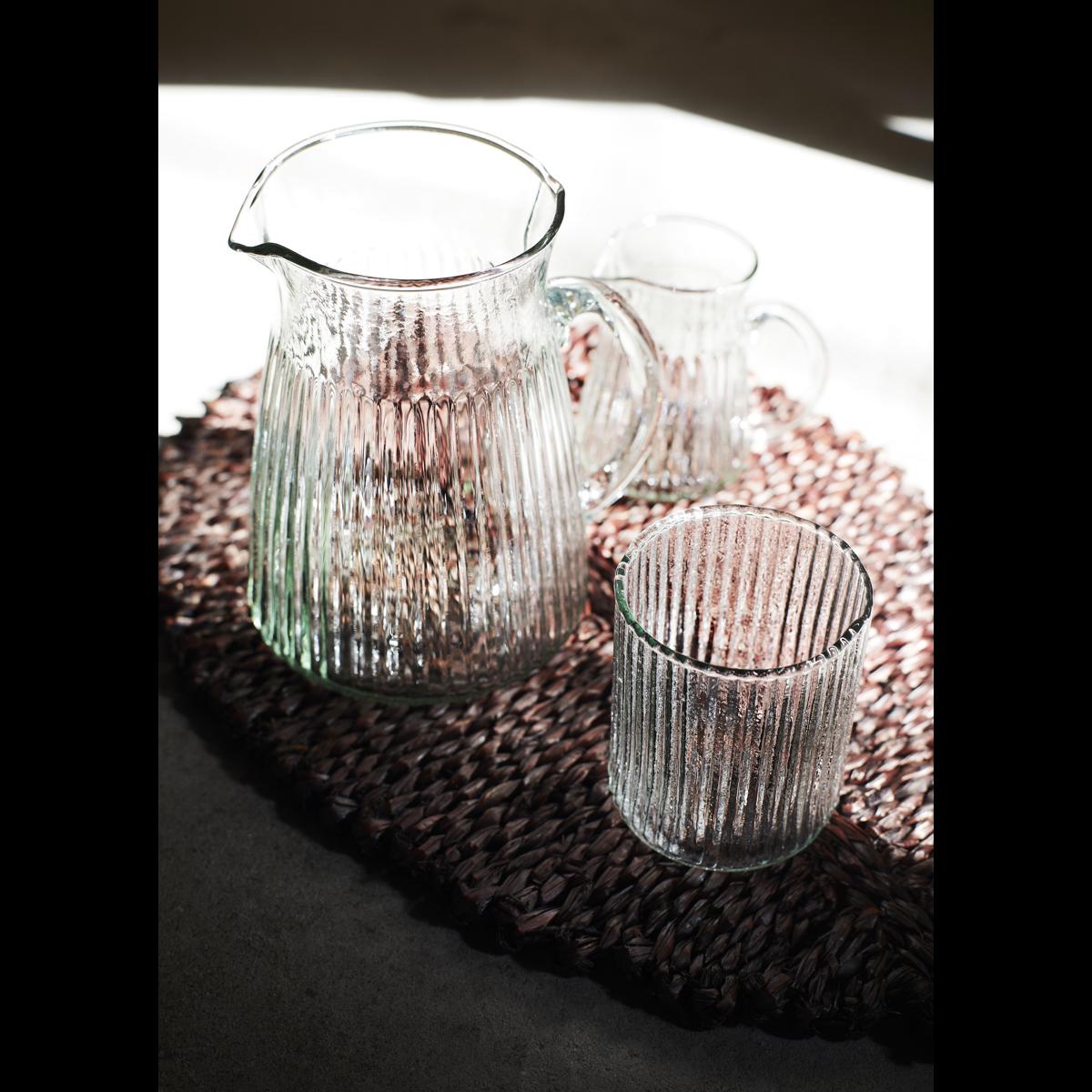 Drinking glass w/ grooves Drinking glass w/ grooves