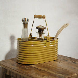 Oval iron utensil holder