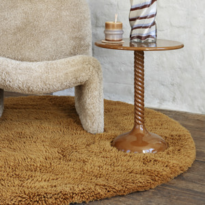 Round tufted woolen rug