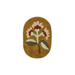 Oval tufted bath mat