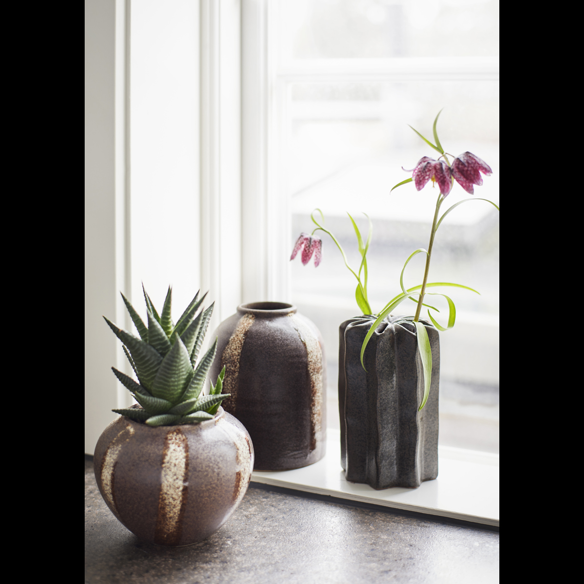 Striped stoneware vase