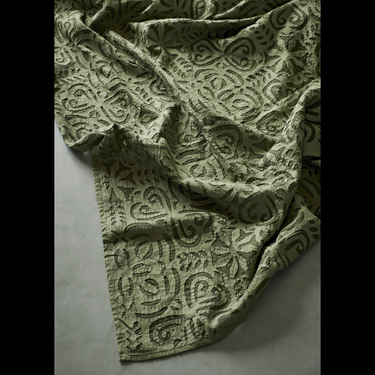 Handmade cutwork throw