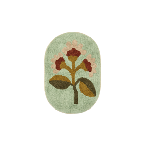 Oval tufted bath mat