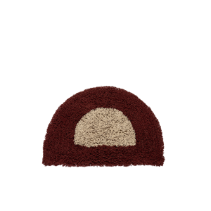 Tufted half-round bath mat
